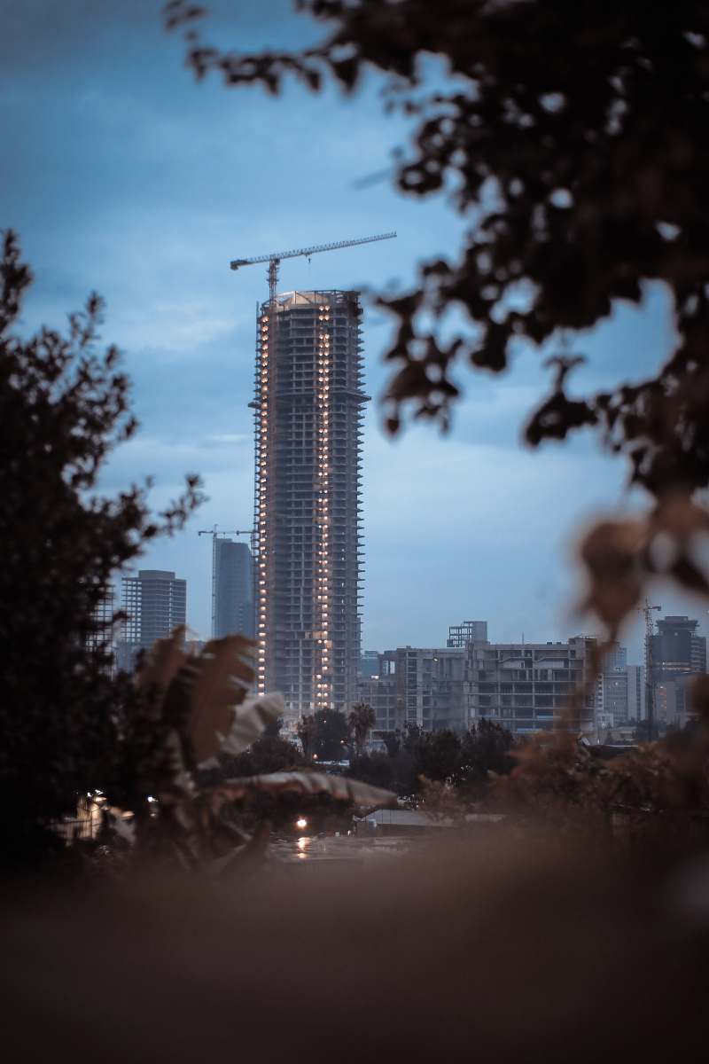 high rise tall building under blue sky during daytime town